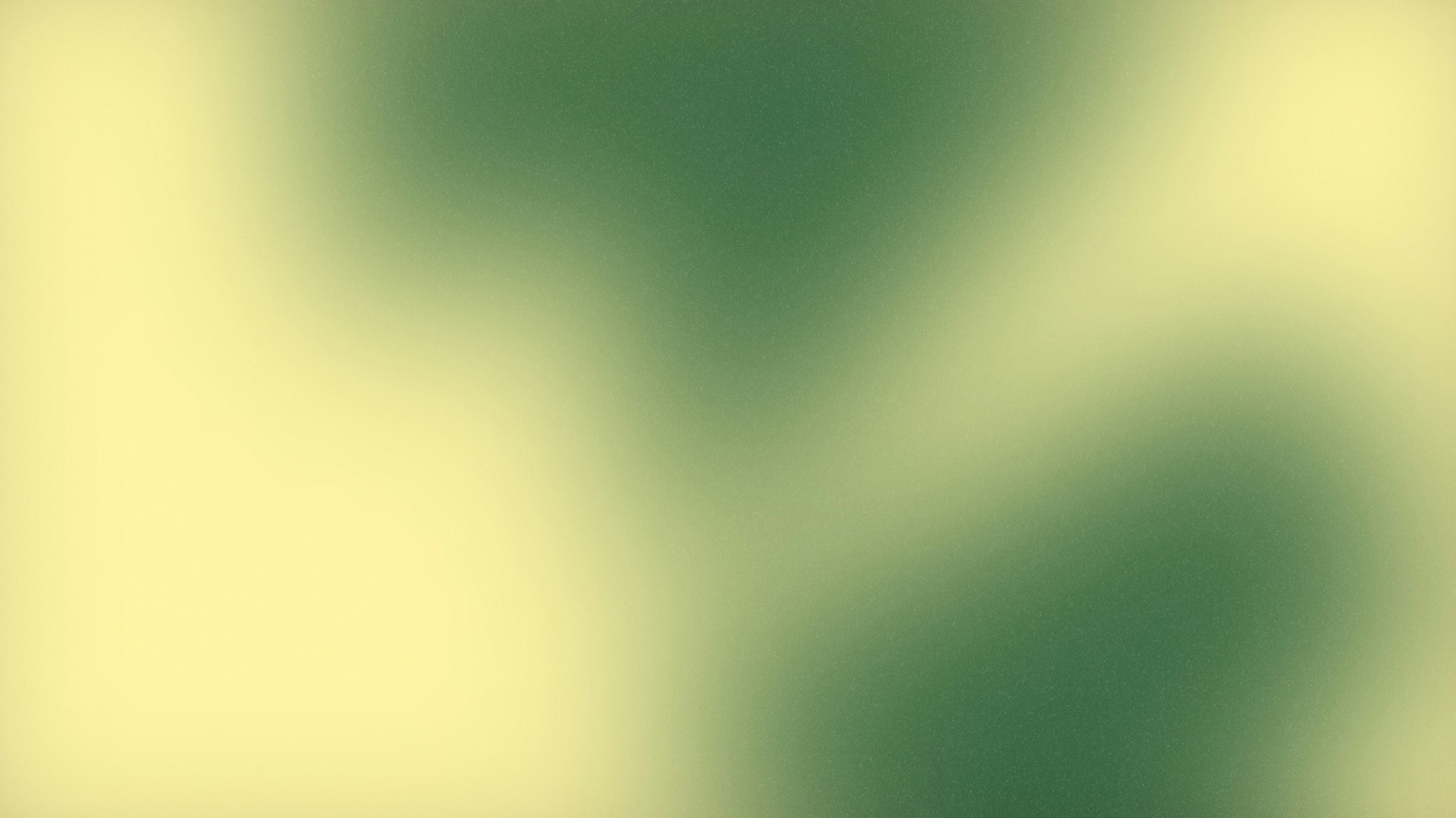 Soft forest green and pale yellow light with a fine grain texture